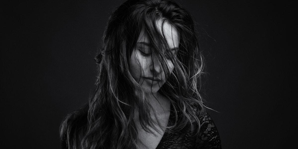 The #1 Sign You're Addicted To Intensity woman in the dark