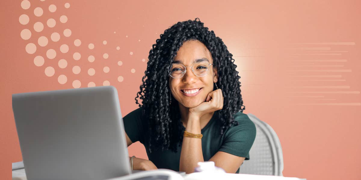 What Your Zodiac Sign Can Manifest On September 7, During Sun Trine Jupiter woman happily working at computer