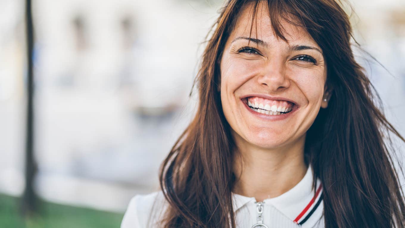 3 Zodiac Signs With The Best Horoscopes On September 15, 2023 smiling woman