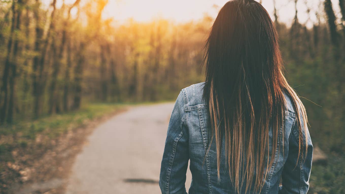 woman walking away