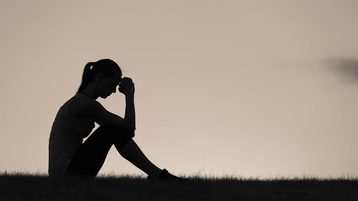 woman sitting alone