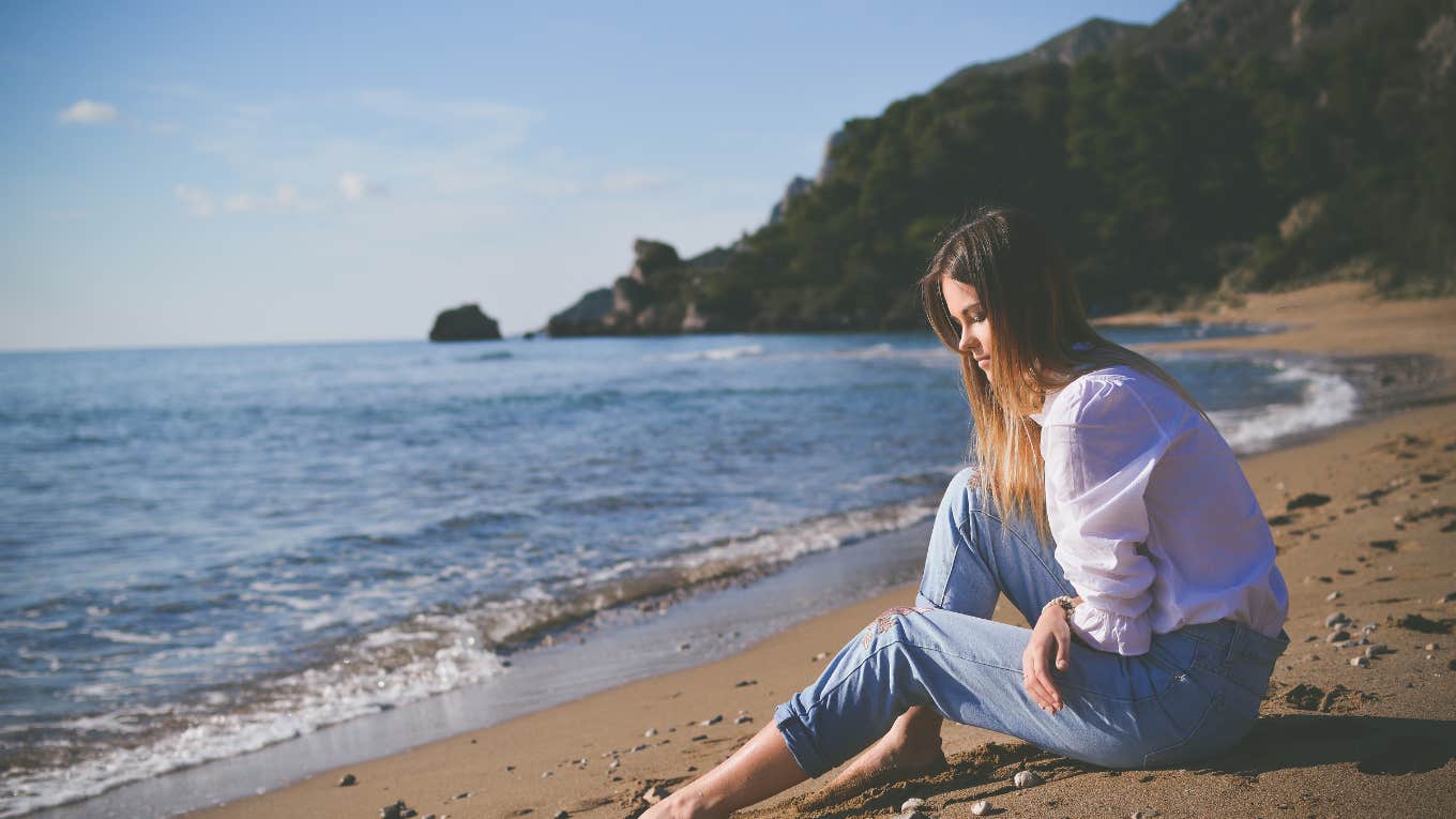 sad woman at the beach