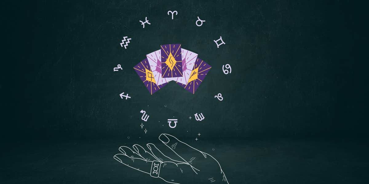 Every Zodiac Sign's Tarot Horoscope For September 5, 2023 hand holding up a group of tarot cards