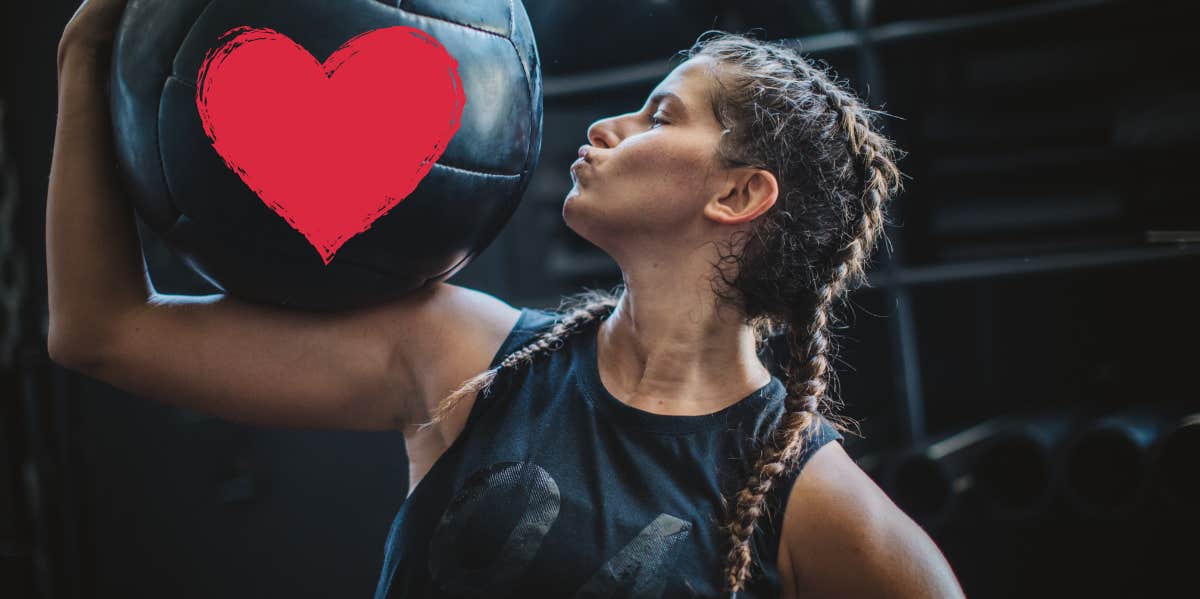 woman kissing a heart