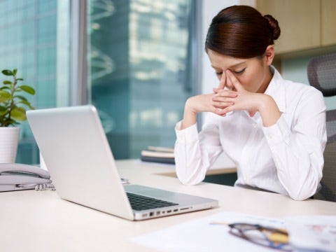 woman looking at computer