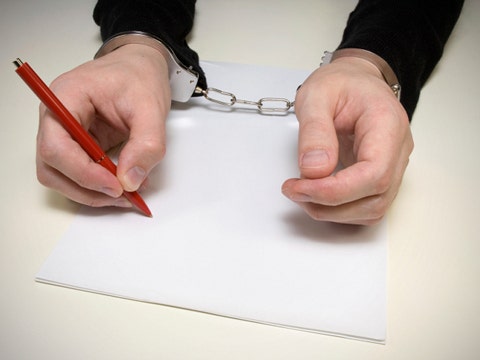 Should I Confess My Affair To My Wife? writing in notebook