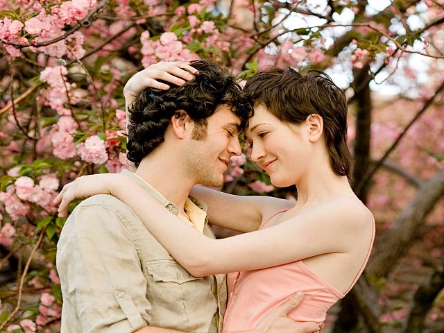 couple with cherry blossoms
