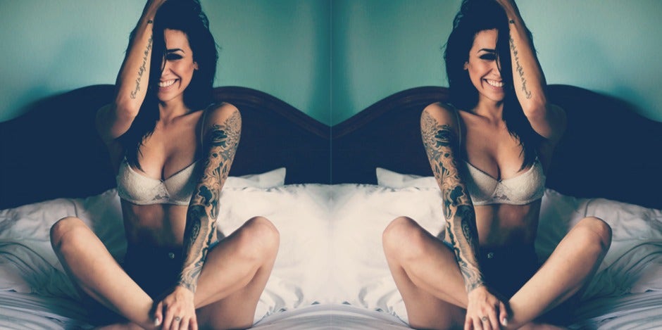 girl laughing on bed girl laughing on bed