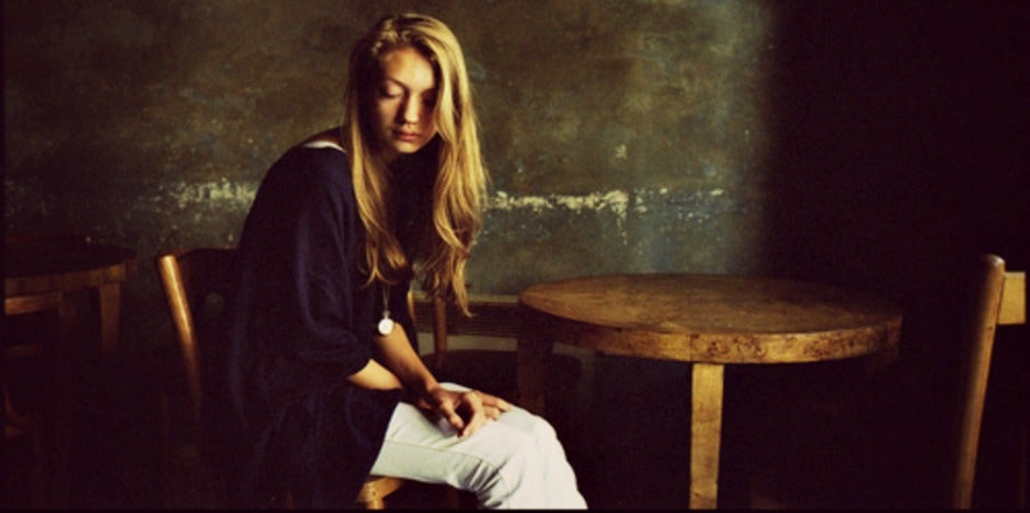 girl sitting at table alone girl sitting at table alone