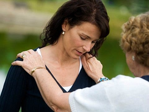 woman being consoled