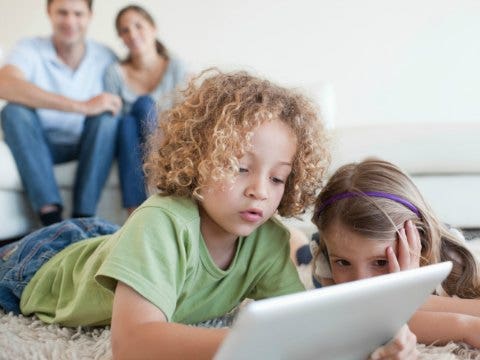 Parenting: Why Does My Kid Feel Entitled To A Cellphone? kids using tablet