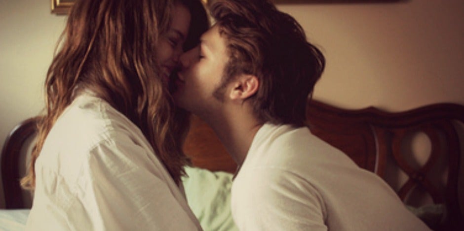 couple kissing in bed couple kissing in bed