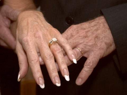 The Joys Of Marrying After 40 older hands with wedding ring