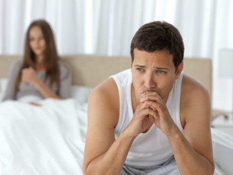 A boyfriend not over his ex man thinking in bed