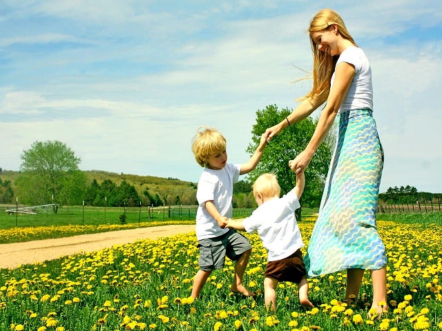 mother playing with her kids.