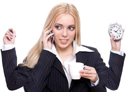 A busy businesswoman business woman multitasking