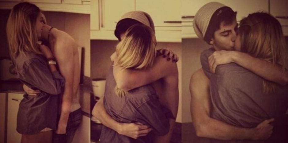 couple kissing in kitchen couple kissing in kitchen