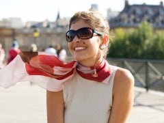 jackie kennedy Dark haired woman with sunglasses and scarf