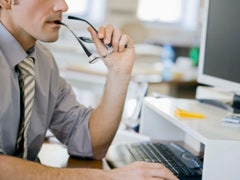 6 Reasons To Put Love Before Your Career man at a computer