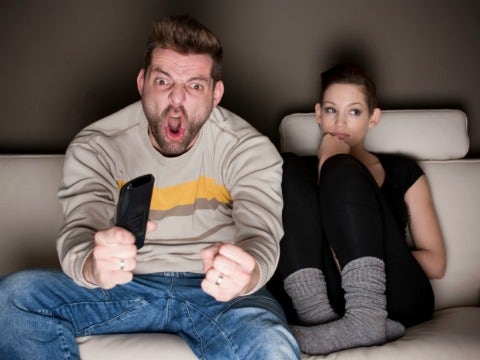 man watching sports with girlfriend I'm A March Madness Widow