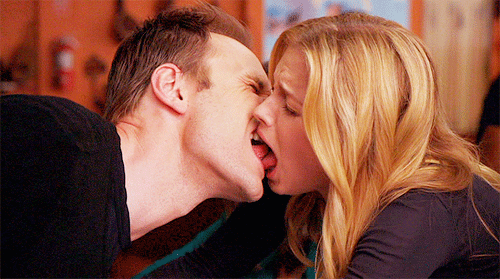 <b> The kiss that makes you want to run far, far, far away. </b>
<b>Awkward Factor</b>: 5/5 champagne flutes. If he licks the side of your face or can't find your mouth... get out. Grab a bottle on your way out, too. New Year's Eve, 2015, kissing
