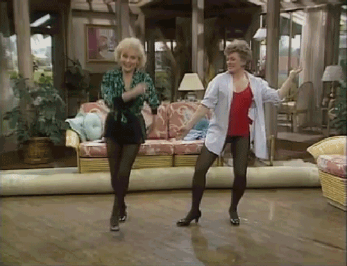 Betty White and Rue McClanahan as Rose Nylund and Blanche Devereaux dancing on "The Golden Girls"