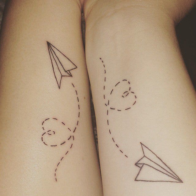 Paper plane best friends matching tattoo 