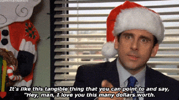 Steve Carell on "The Office" wearing a Santa Claus hat