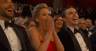 Jennifer Lawrence and Nicholas Hoult used to be madly in love and super, super adorable Jennifer Lawrence and Nicholas Hoult at the 2014 Oscars - Giphy