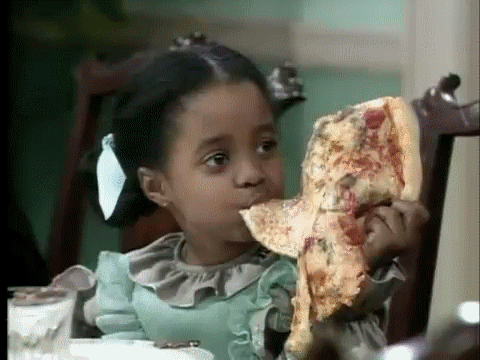 Rudy Huxtable eating pizza