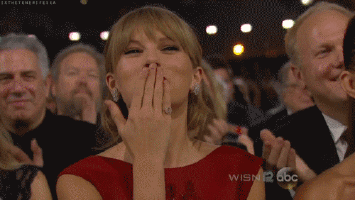 Taylor Swift blowing a kiss