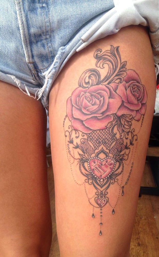 thigh tattoo ideas for women: girly flower
