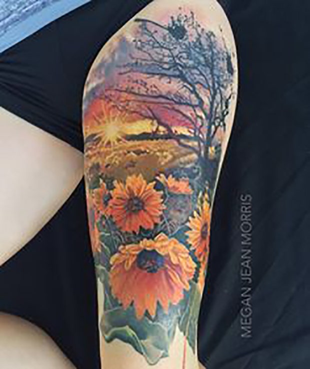 thigh tattoo ideas for women: sunset