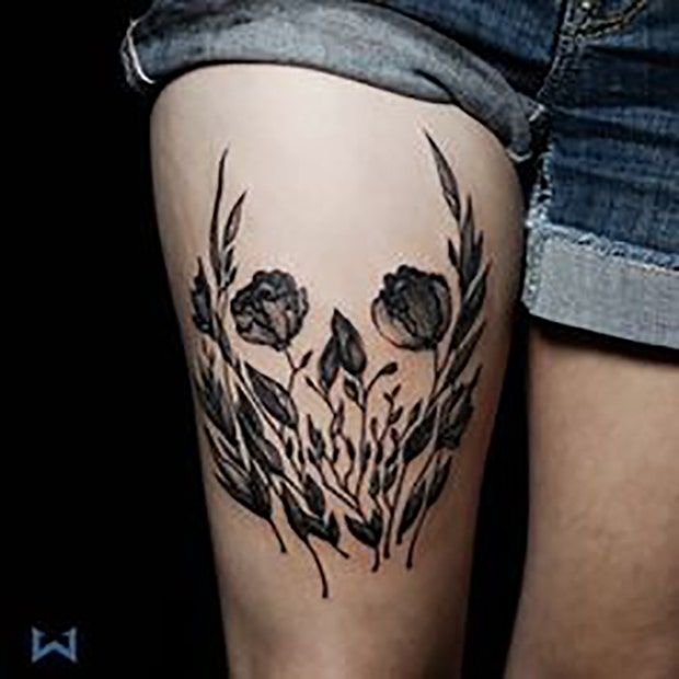 thigh tattoo ideas for women: skull