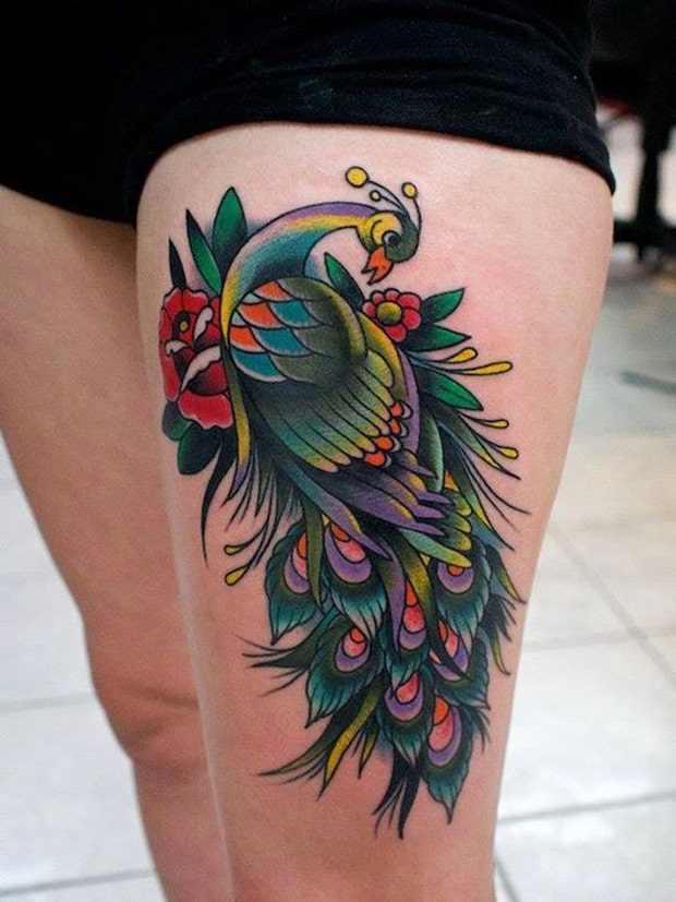 thigh tattoo ideas for women: peacock
