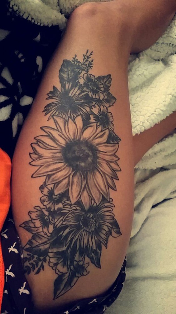 thigh tattoo ideas for women: black sunflower