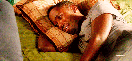 new girl winston crying on the couch