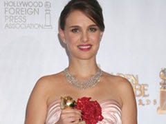 Natalie Portman wins a Golden Globe. Natalie Portman wins a Golden Globe.