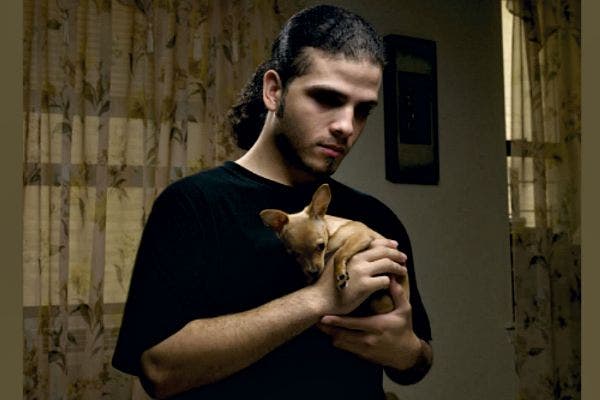 Man with tiny dog.