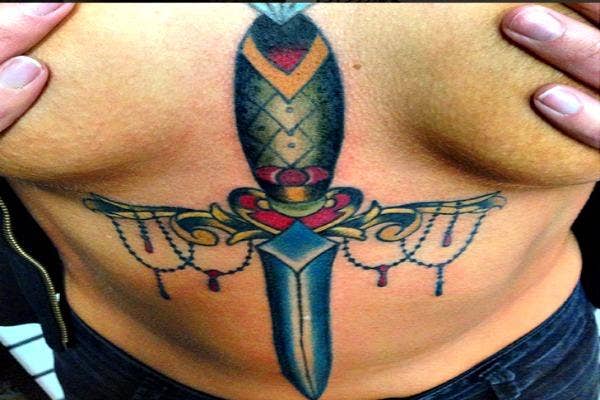Dagger tattoo.