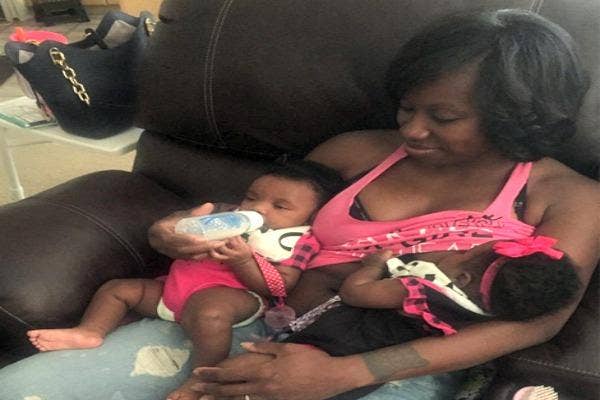 Mother tandem breastfeeding.