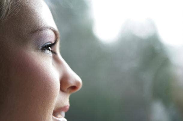 A woman looking out the window