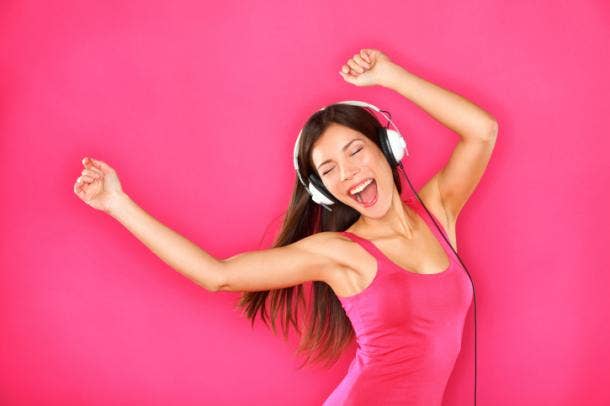 Woman dancing to music