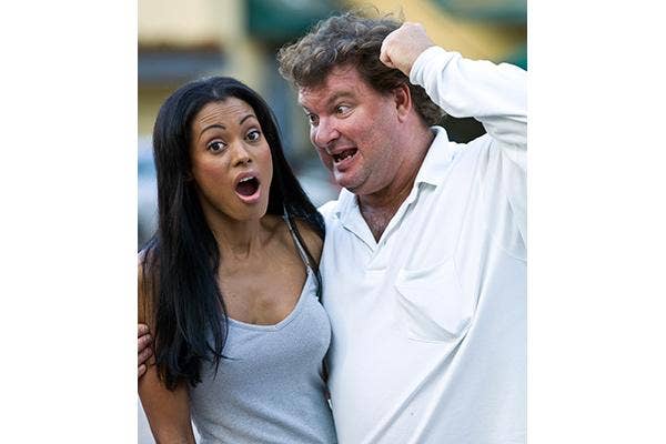 Fat Guy With Young, Attractive Woman
