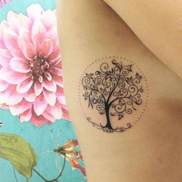 Geometric style flower/tree of life tattoo idea | TattoosAI