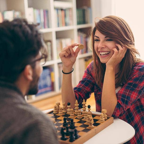 couple playing chess