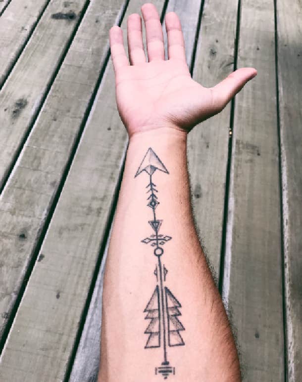 large arrow tattoo