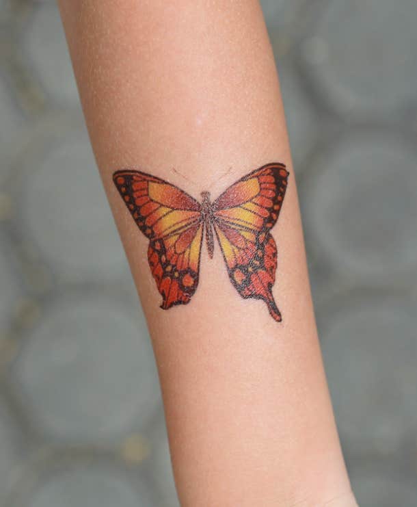 butterfly tattoo idea for women