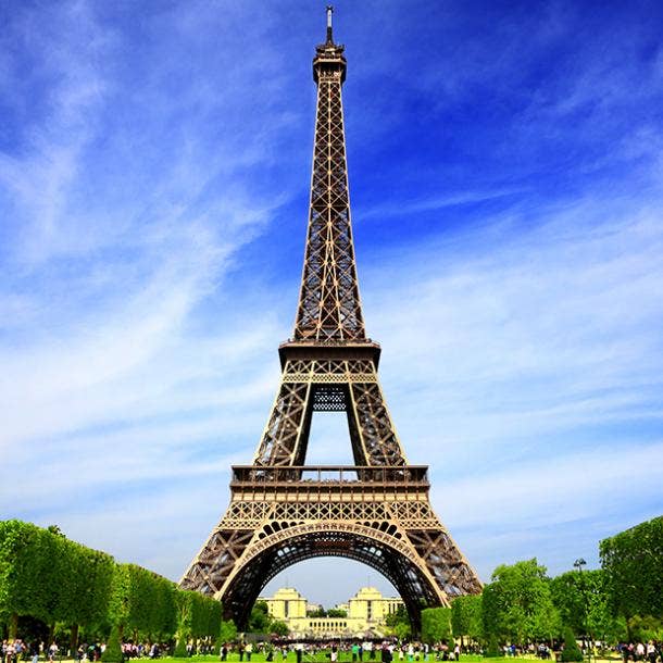 Visitors view the Eiffel Tower from up close