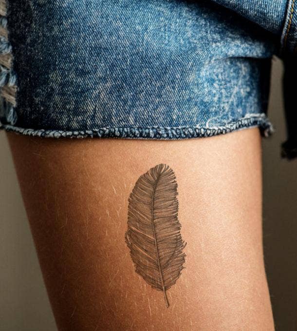 feather tattoo idea for women